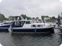 Holland Perebom - barco a motor